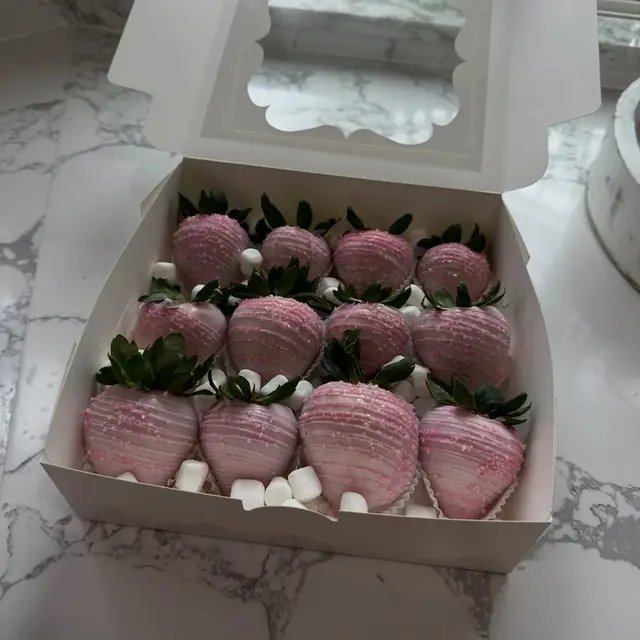 Blush dipped strawberries with white chocolate drizzle