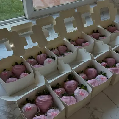 Rows of boxed chocolate covered strawberries ready for pickup