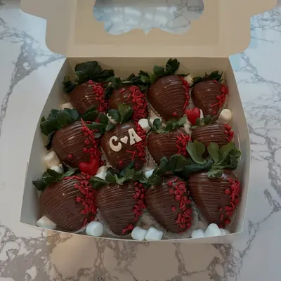 Milk chocolate strawberries with piped initials